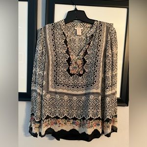 Sheer Sundance silk blouse with black tank underneath.